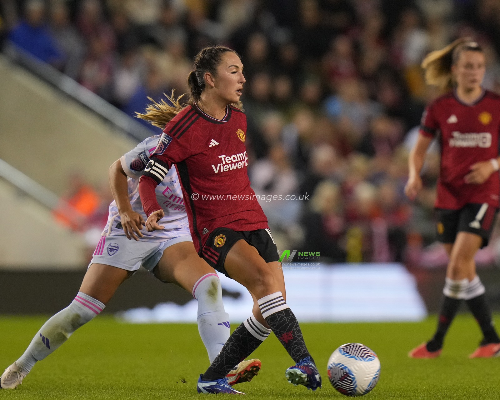 Katie Zelem #10 of Manchester United passes the ball during the The FA Women's Super League match Manchester United Women vs Arsenal Women at Leigh Sports Village, Leigh, United Kingdom, 6th October 2023

(Photo by Steve Flynn/News Images)