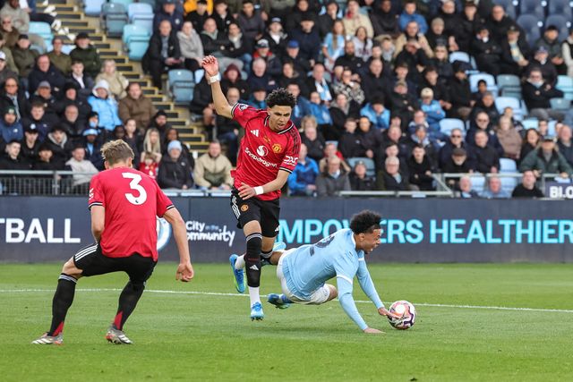 Dante Headley of Manchester City U18's dives in the area and receives a yellow card for his actions during the FA Youth Cup Final match Manchester City U18 vs Manchester United U18 at Joie Stadium, Manchester, United Kingdom on 14 May 2026

(Photo by Mark Cosgrove/News Images)