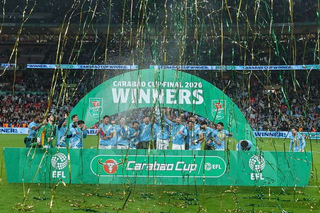 Manchester City players lift the trophy after the final whistle during the Carabao Cup Final match Arsenal vs Manchester City at Emirates, London, United Kingdom on 22 March 2026

(Photo by Alfie Cosgrove/News Images)