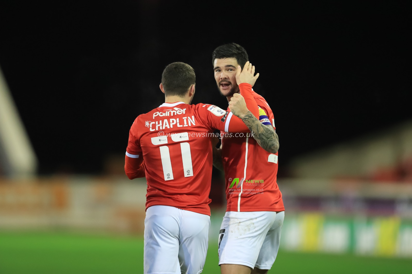 Alex Mowatt #27 of Barnsley celebrates his goal to make it 1-1 with Conor Chaplin #11 of Barnsley