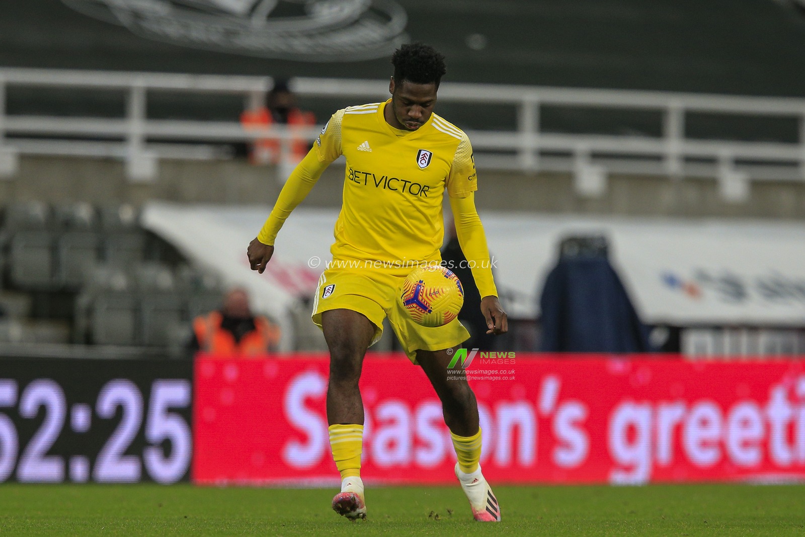 Ola Aina #34 of Fulham with the ball