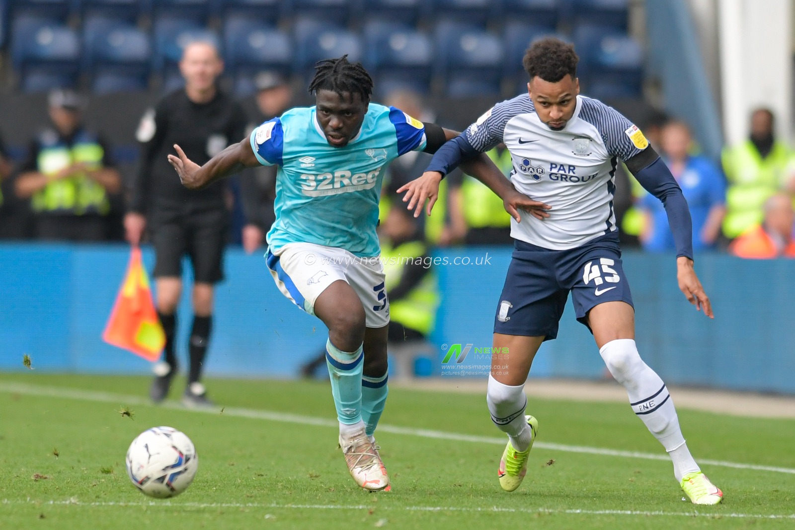 Festy Ebosele #36 of Derby County and Josh Murphy #45 of Preston North End compete for the ball