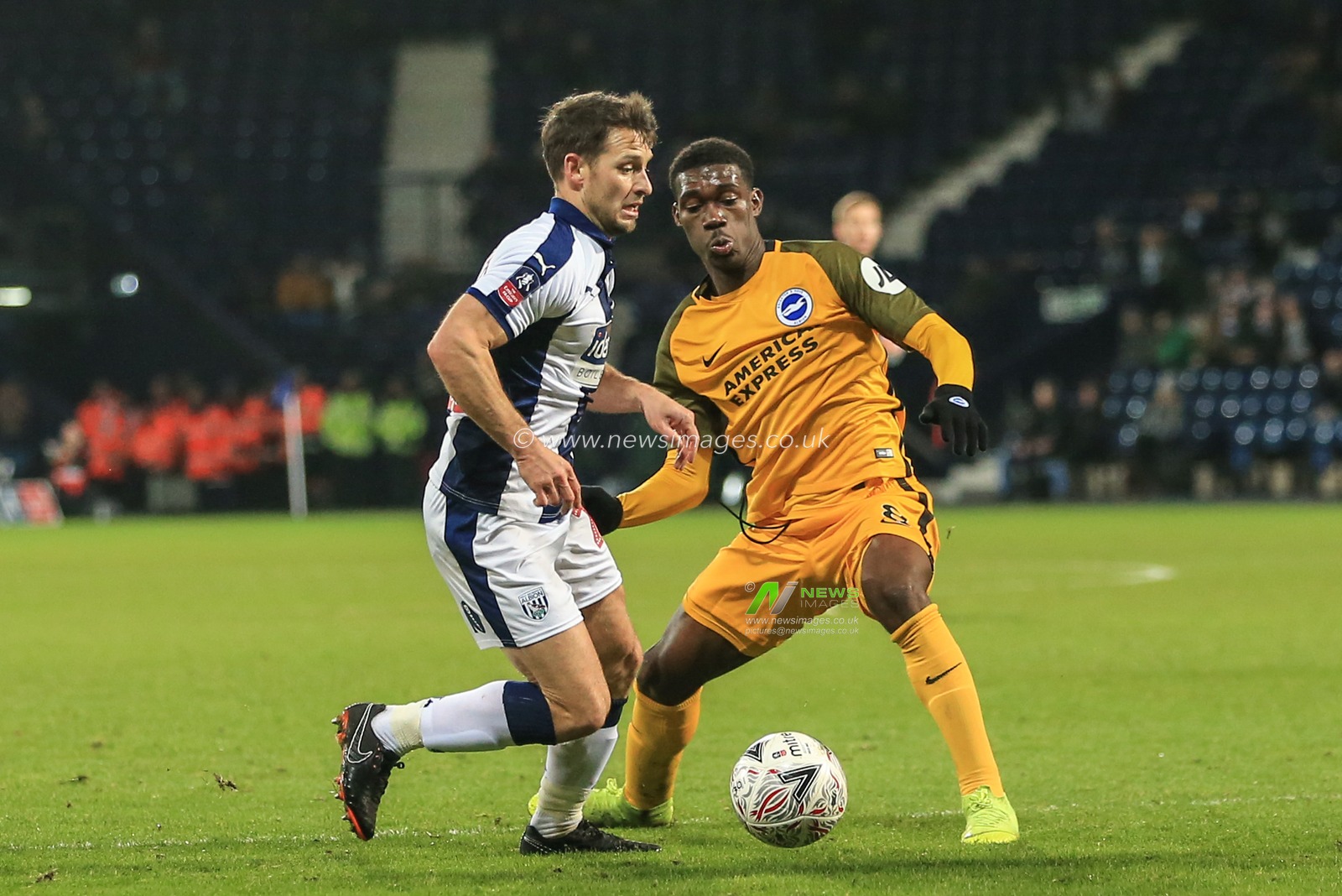 6th February 2019, The Hawthorns, West Bromwich, England; Emirates FA Cup, 4th Round replay, West Bromwich Albion vs Brighton ; Wes Hoolahan (22) of West Brom goes past Yves Bissouma (08) of Brighton 

Credit: Mark Cosgrove/News Images,

English Football League images are subject to DataCo Licence