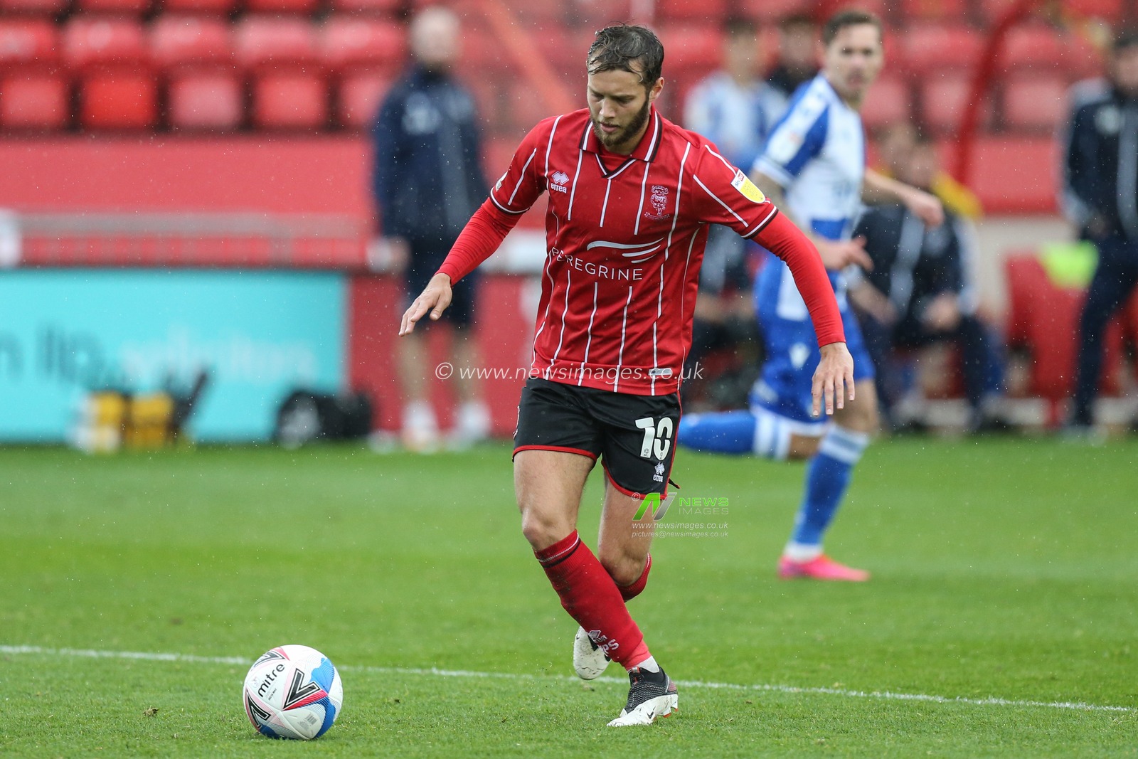 Jorge Grant (10) of Lincoln City match image