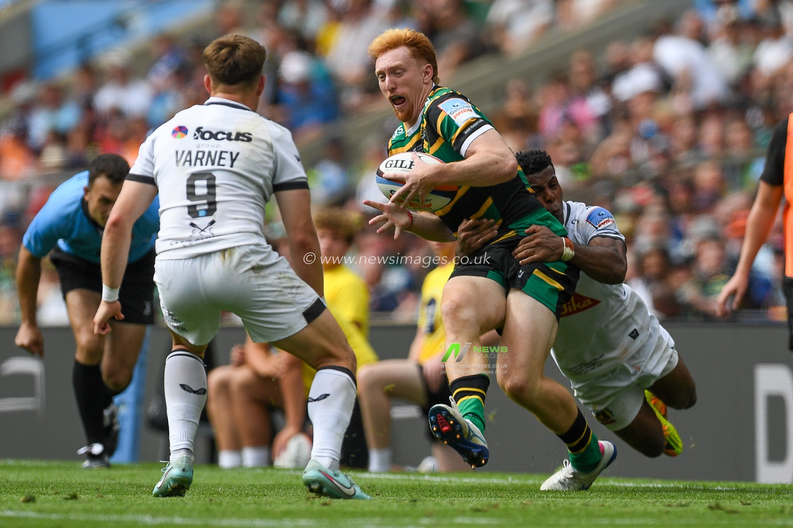 George Hendy of Northampton Saints tackled by Immanuel Feyi-Waboso of Exeter Chiefs during the Gallagher PREM Final match Northampton Saints vs Exeter Chiefs at Allianz Stadium, Twickenham, United Kingdom on 20 June 2026.

(Photo by Alex Williamson/News Images)