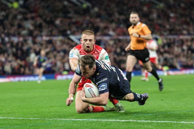Harry Smith of Wigan Warriors goes over for a try during the 2025 Betfred Super League Grand Final Hull KR v Wigan Warriors at Old Trafford, Manchester, United Kingdom, 11th October 2025

(Photo by Mark Cosgrove/News Images)