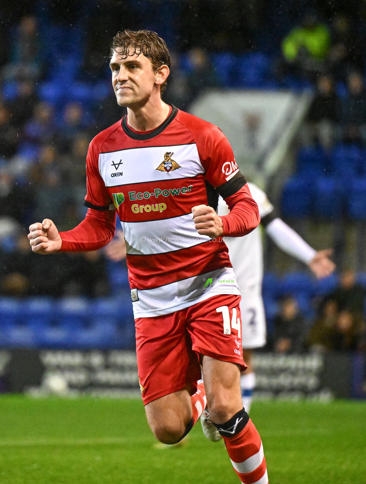 Harrison Biggins 14# of Doncaster Rovers Football Club celebrates his goal and the opening goal of the match, during the Sky Bet League 2 match Tranmere Rovers vs Doncaster Rovers at Prenton Park, Birkenhead, United Kingdom, 20th October 2023

(Photo by Cody Froggatt/News Images)