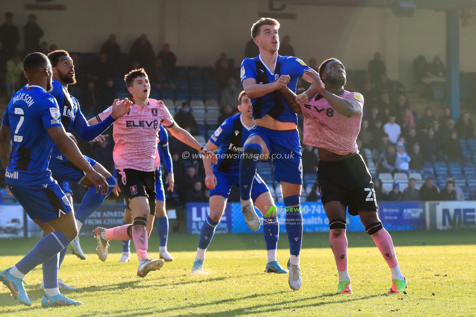 Cheyenne Dunkley #22 of Sheffield Wednesday competes whilst having his shirt pulled.