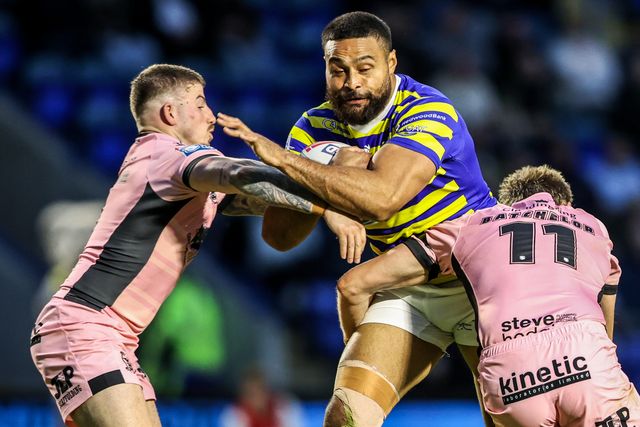 Toafofoa Sipley of Warrington Wolves is tackled by Matty Laidlaw of Hull FC and Joe Batchelor of Hull FC during the Betfred Super League round 13 match Warrington Wolves vs Hull FC at The Halliwell Jones Stadium, Warrington, United Kingdom on 05 June 2026

(Photo by Alfie Cosgrove/News Images)