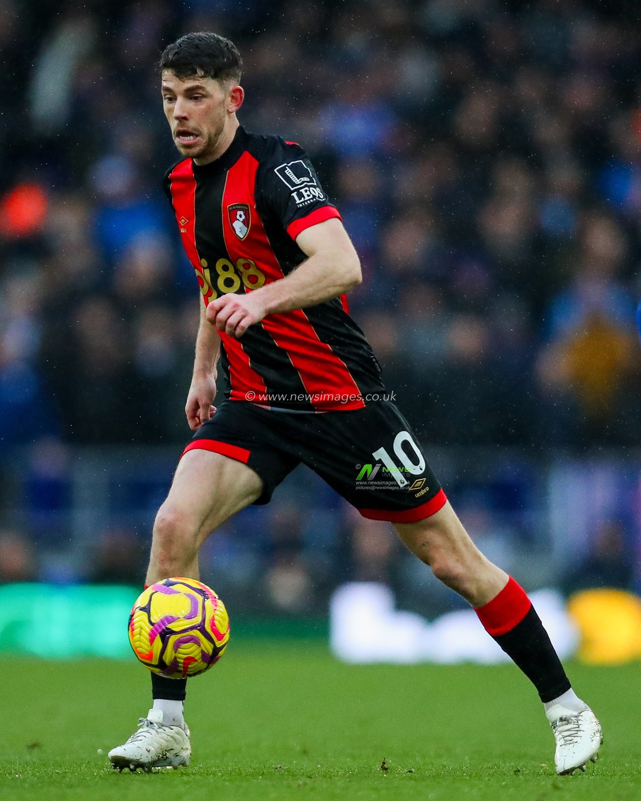 Adam Smith of AFC Bournemouth runs with the ball during the Premier League match Ipswich Town vs Bournemouth at Portman Road, Ipswich, United Kingdom, 8th December 2024

(Photo by Izzy Poles/News Images)