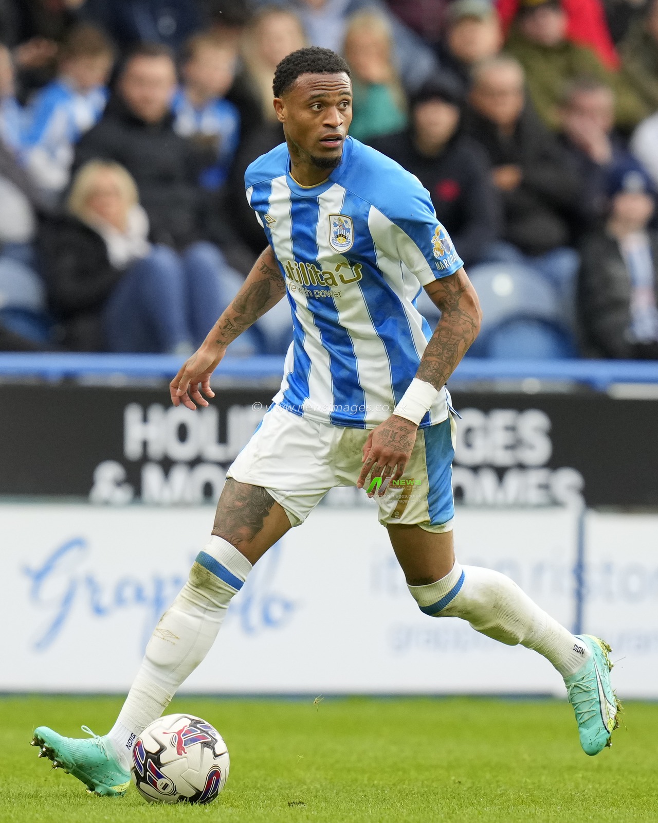 Delano Burgzorg #7 of Huddersfield Town during the Sky Bet Championship match Huddersfield Town vs Queens Park Rangers at John Smith's Stadium, Huddersfield, United Kingdom, 21st October 2023

(Photo by Steve Flynn/News Images)