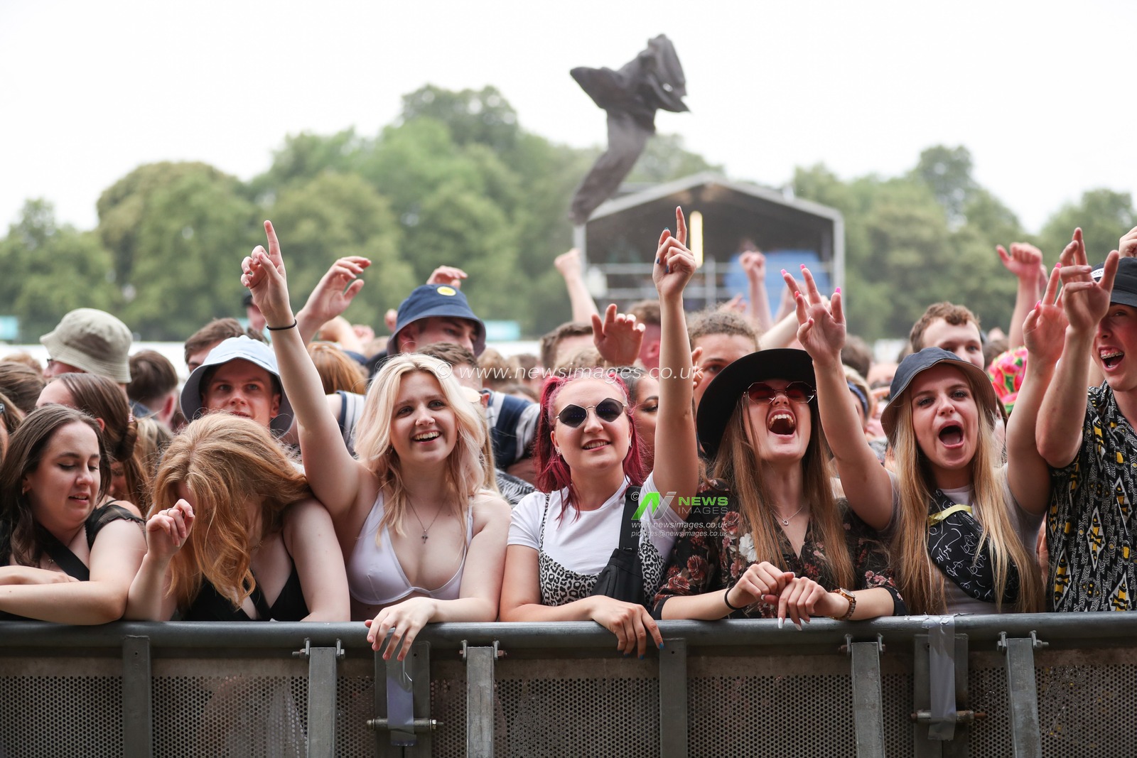 Festival goers enjoy the music during Day One of Tramlines Festival