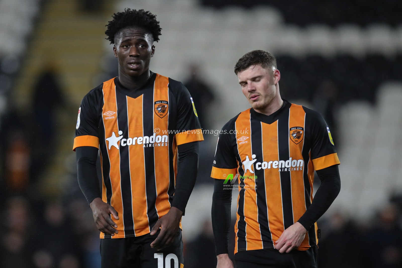 Malcolm Ebiowei #10 of Hull City and Regan Slater #27 of Hull City walk off the field after the Sky Bet Championship match Hull City vs Burnley at MKM Stadium, Hull, United Kingdom, 15th March 2023

(Photo by James Heaton/News Images)