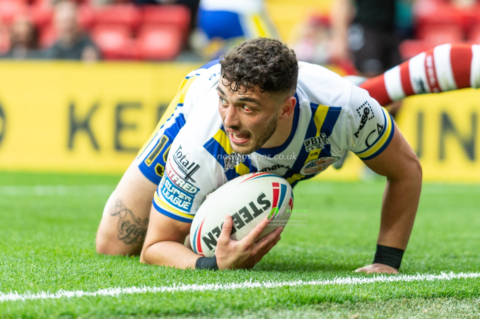 25th May 2019 , Anfield Stadium, Liverpool, England; Dacia Magic Weekend, Betfred Super League Round 16, Wigan Warriors vs Warrington Wolves ; Declan Patton of Warrington Wolves scores a try

Credit: Richard Long/News Images