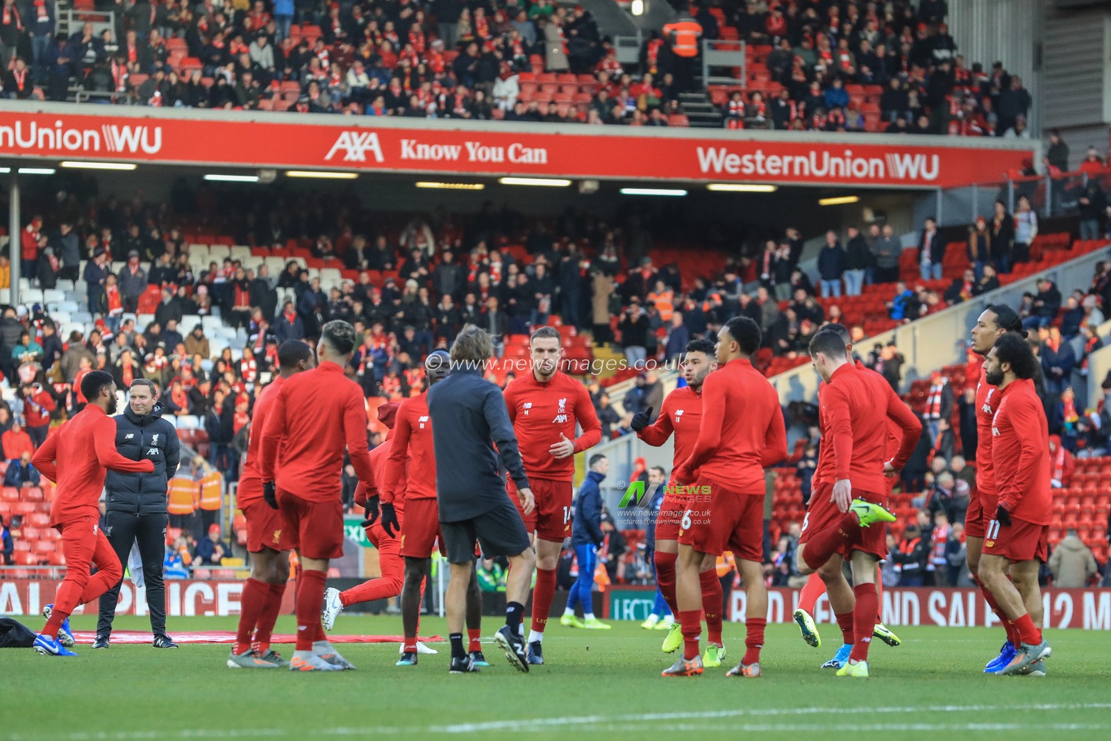30th November 2019, Anfield, Liverpool, England; Premier League, Liverpool v Brighton and Hove Albion : Liverpool players warming up 

Credit: Mark Cosgrove/News Images