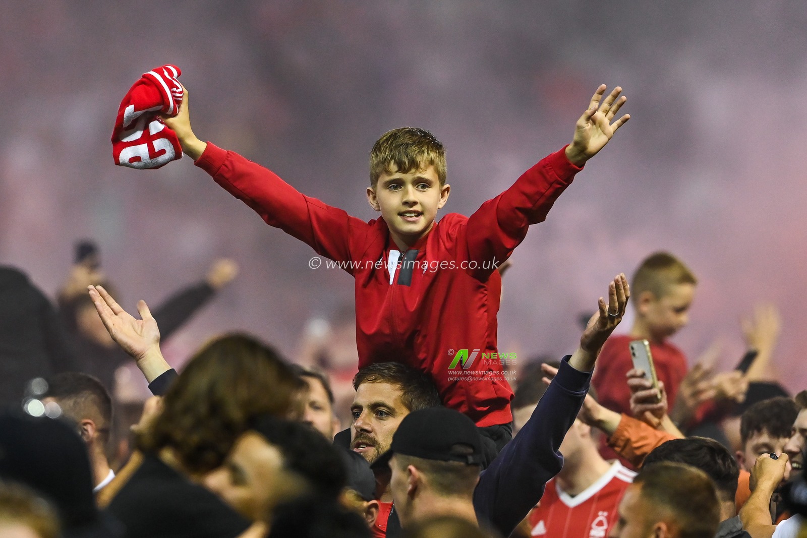 A Young Nottingham Forest fan celebrates his sides win to take them to the Championship playoff final