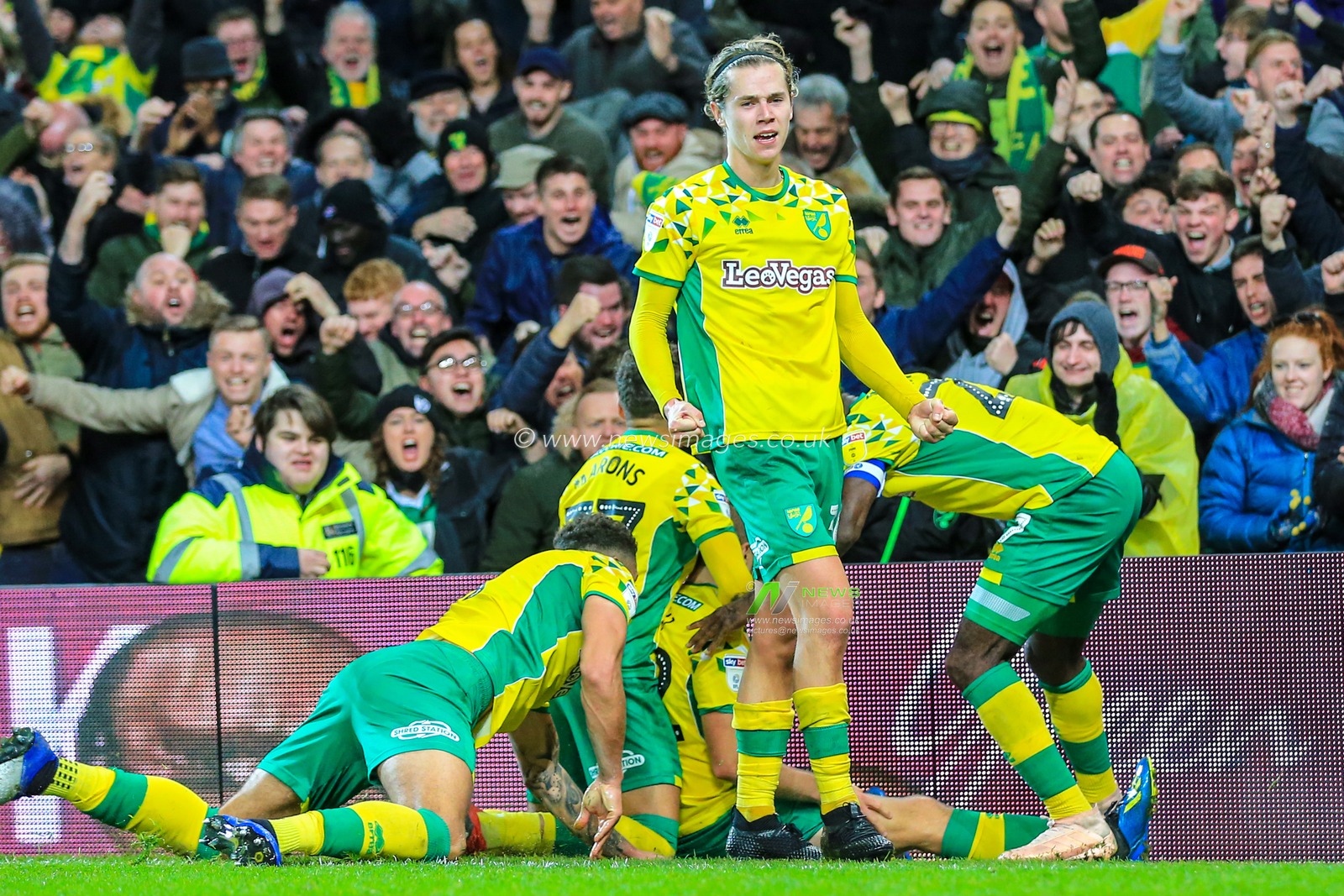 8th December 2018, Carrow Road, Norfolk, England; Sky Bet Championship, Norwich City v Bolton Wonderers ;  Todd Cantwell (36) of Norwich City celebrates Teemu Pukki (22) of Norwich City's winning goal to make the score 3-2.

Credit: Georgie Kerr/News Images

English Football League images are subject to DataCo Licence