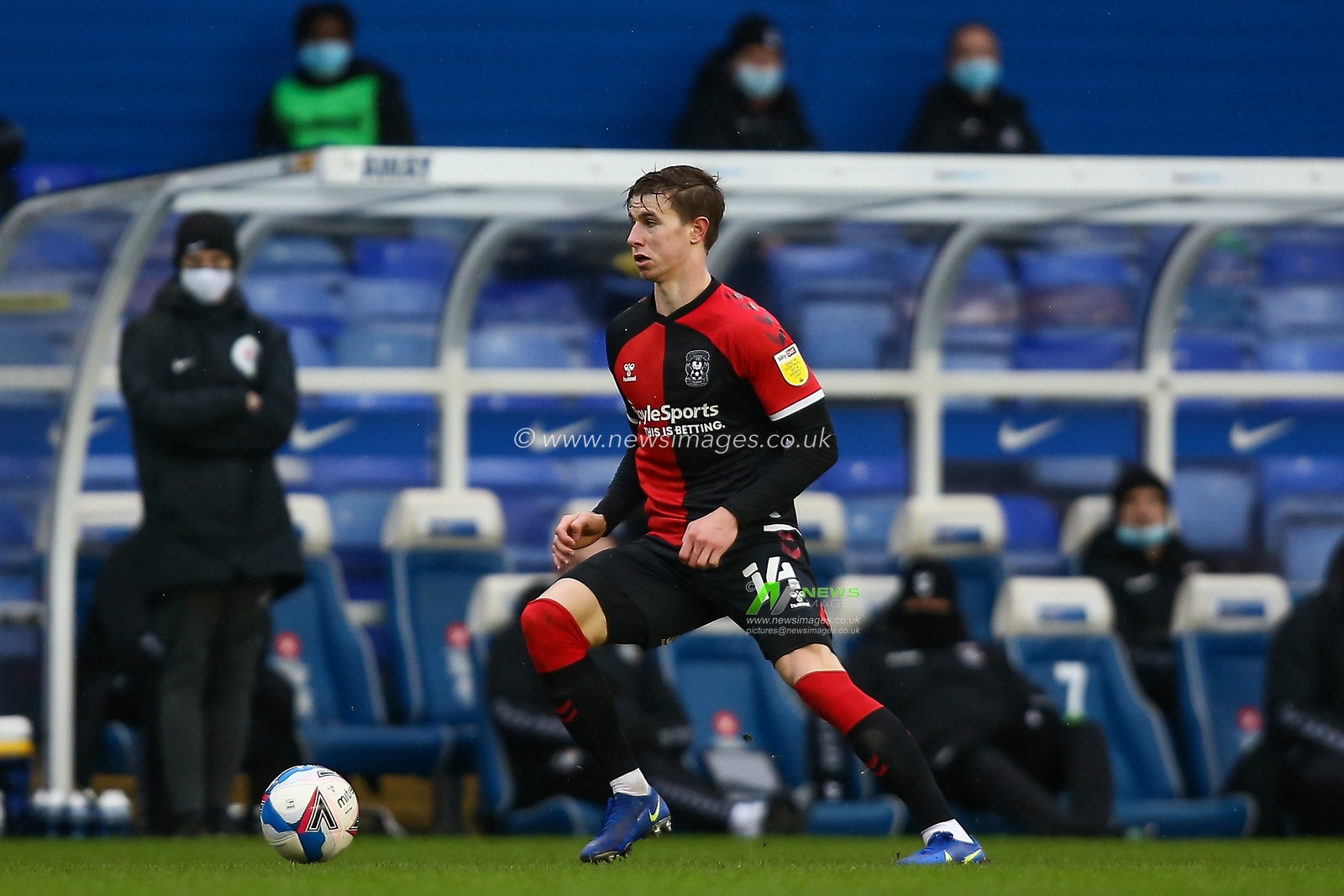 Ben Sheaf #14 of Coventry City dribbles the ball