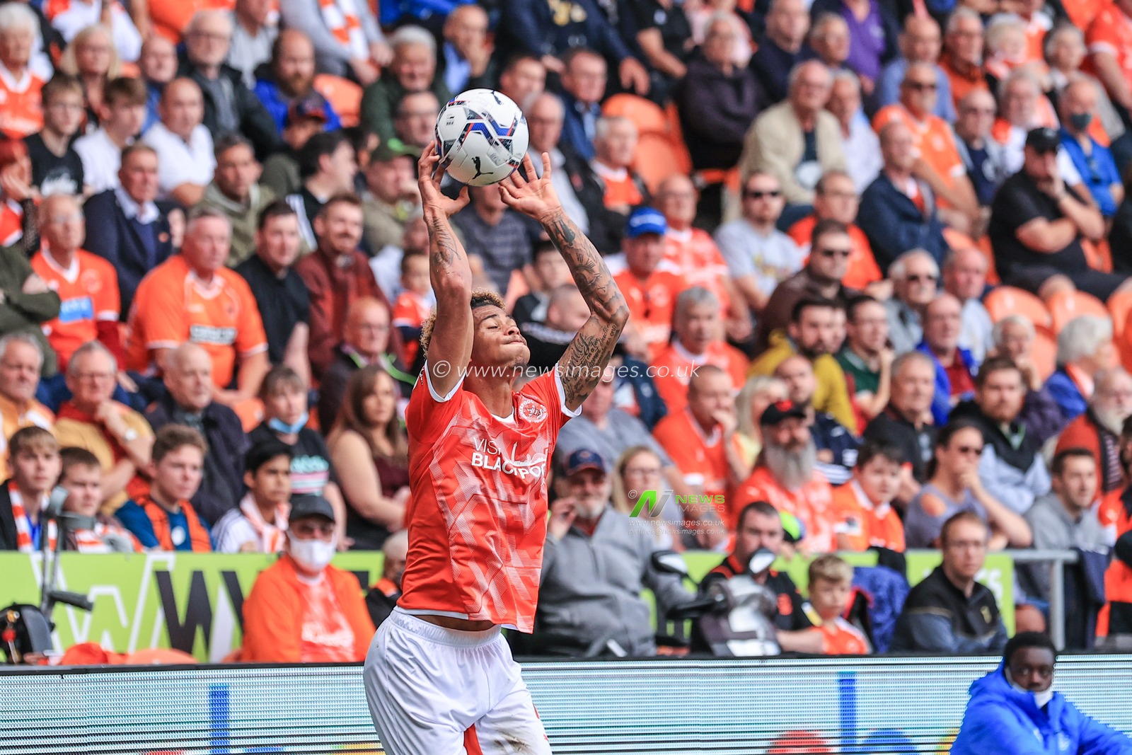Jordan Gabriel #4 Of Blackpool takes a throw-in