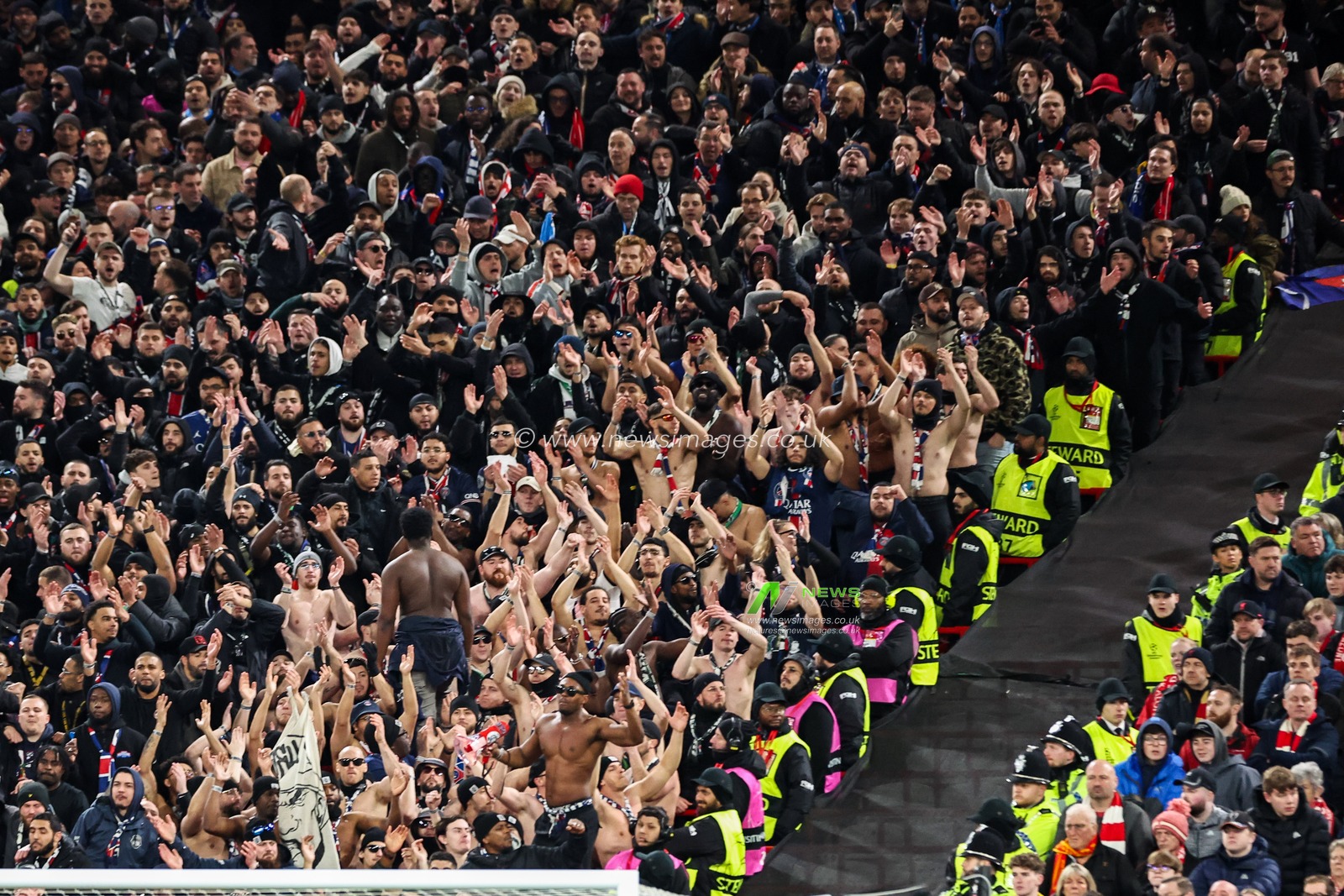 Paris Saint-Germain fans celebrate the team's first during the UEFA Champions League Last 16 match Liverpool vs Paris Saint-Germain at Anfield, Liverpool, United Kingdom, 11th March 2025

(Photo by Mark Cosgrove/News Images)