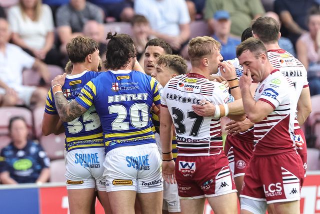Ewan Irwin of Warrington Wolves celebrates his try with teammates during the Betfred Super League round 18 match Wigan Warriors vs Warrington Wolves at The Brick Community Stadium, Wigan, United Kingdom on 10 July 2026

(Photo by Mark Cosgrove/News Images)