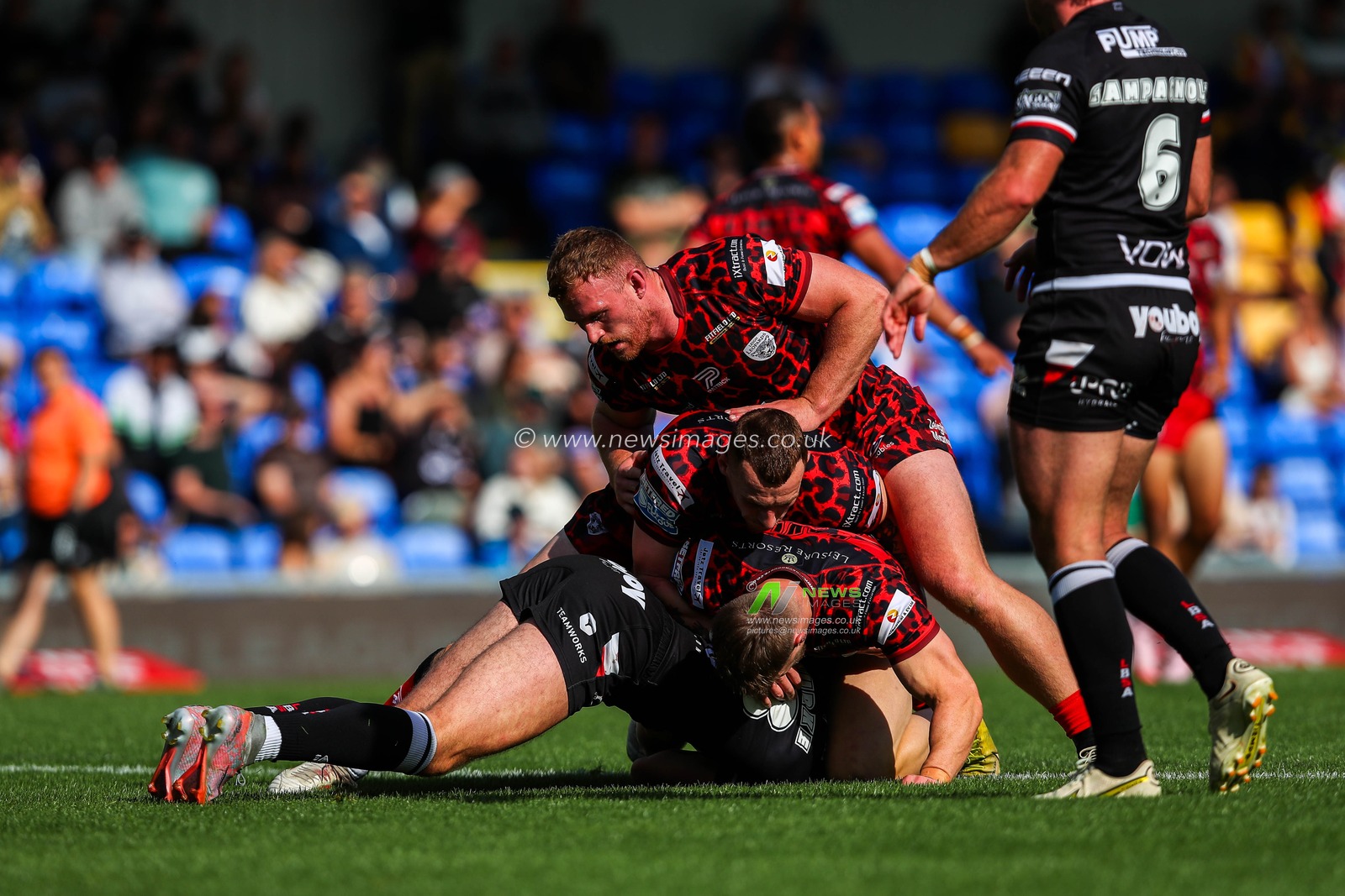 Leigh Leopards make a tackle during the Betfred Super League Round 23 match London Broncos vs Leigh Leopards at Plough Lane, Wimbledon, United Kingdom, 25th August 2024

(Photo by Izzy Poles/News Images)