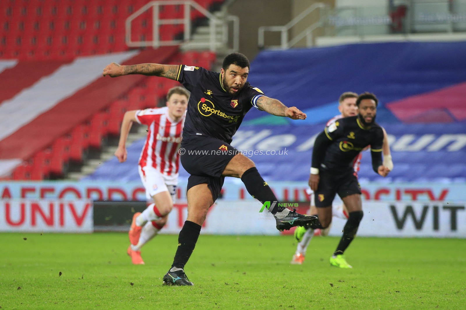 GOAL Troy Deeney #9 of Watford scores from the penalty spot to make it 0-1