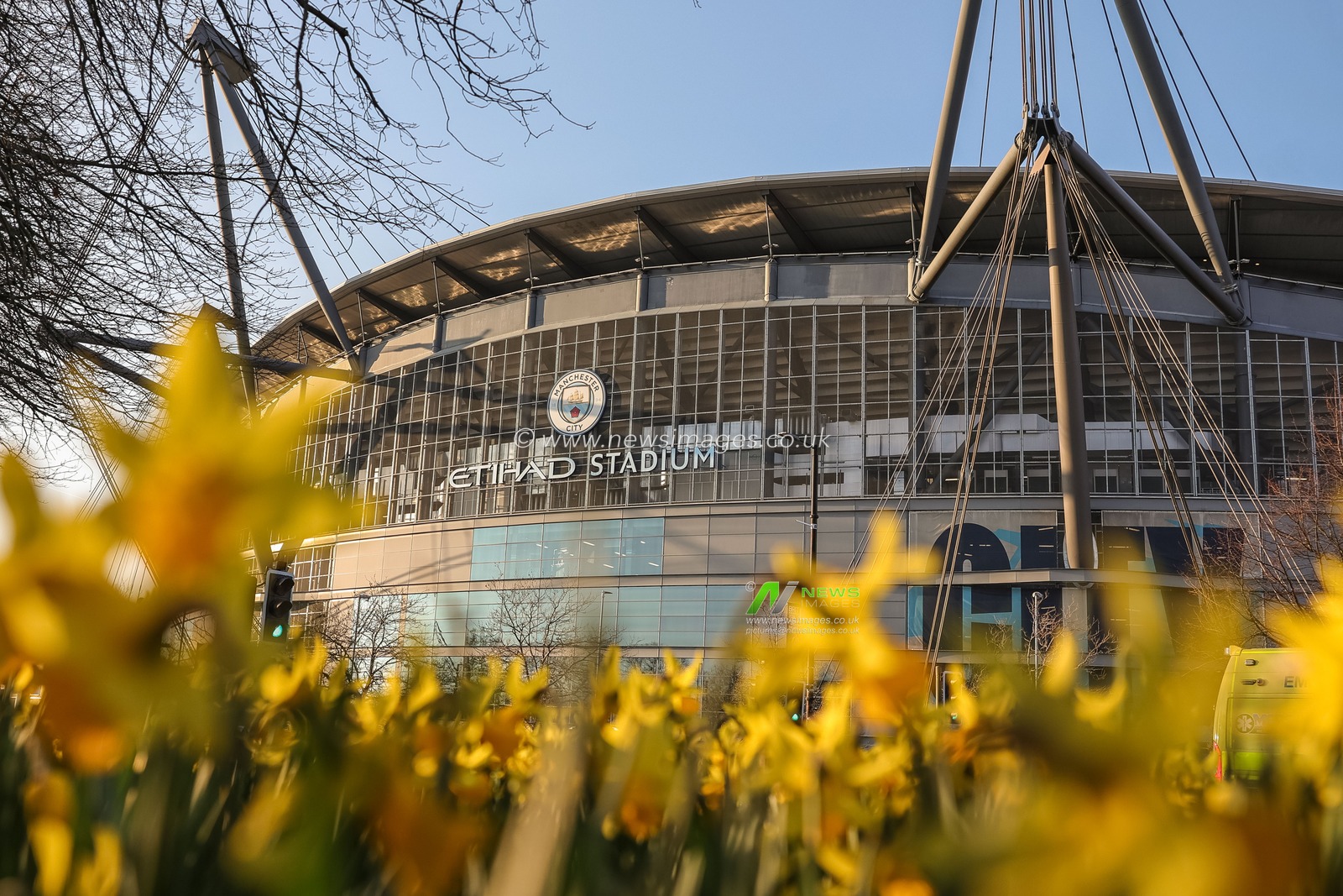 A general view of the Etihad Stadium through a bed of daffodils during the Premier League match Manchester City vs Nottingham Forest at Etihad Stadium, Manchester, United Kingdom on 04 March 2026

(Photo by Mark Cosgrove/News Images)