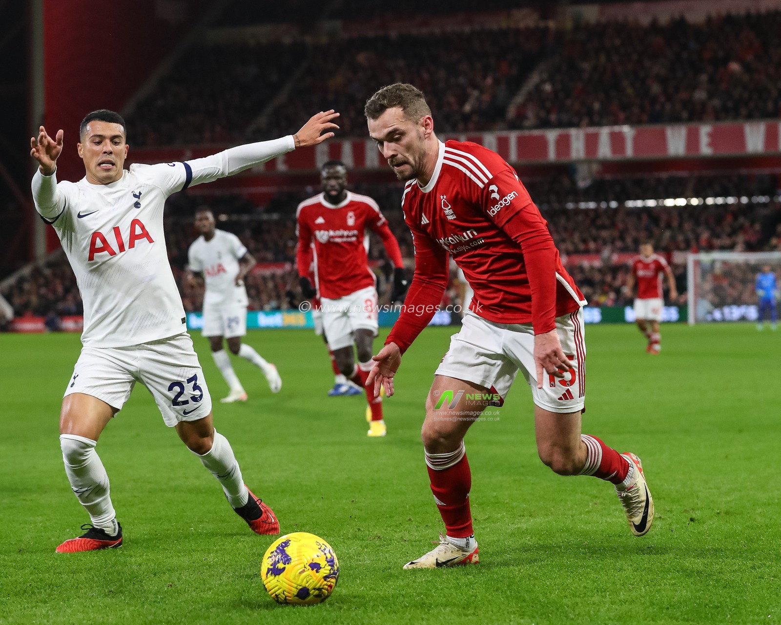 Harry Toffolo #15 of Nottingham Forest holds the ball as Pedro Porro #23 of Tottenham Hotspur pressures during the Premier League match Nottingham Forest vs Tottenham Hotspur at City Ground, Nottingham, United Kingdom, 15th December 2023

(Photo by Gareth Evans/News Images)
