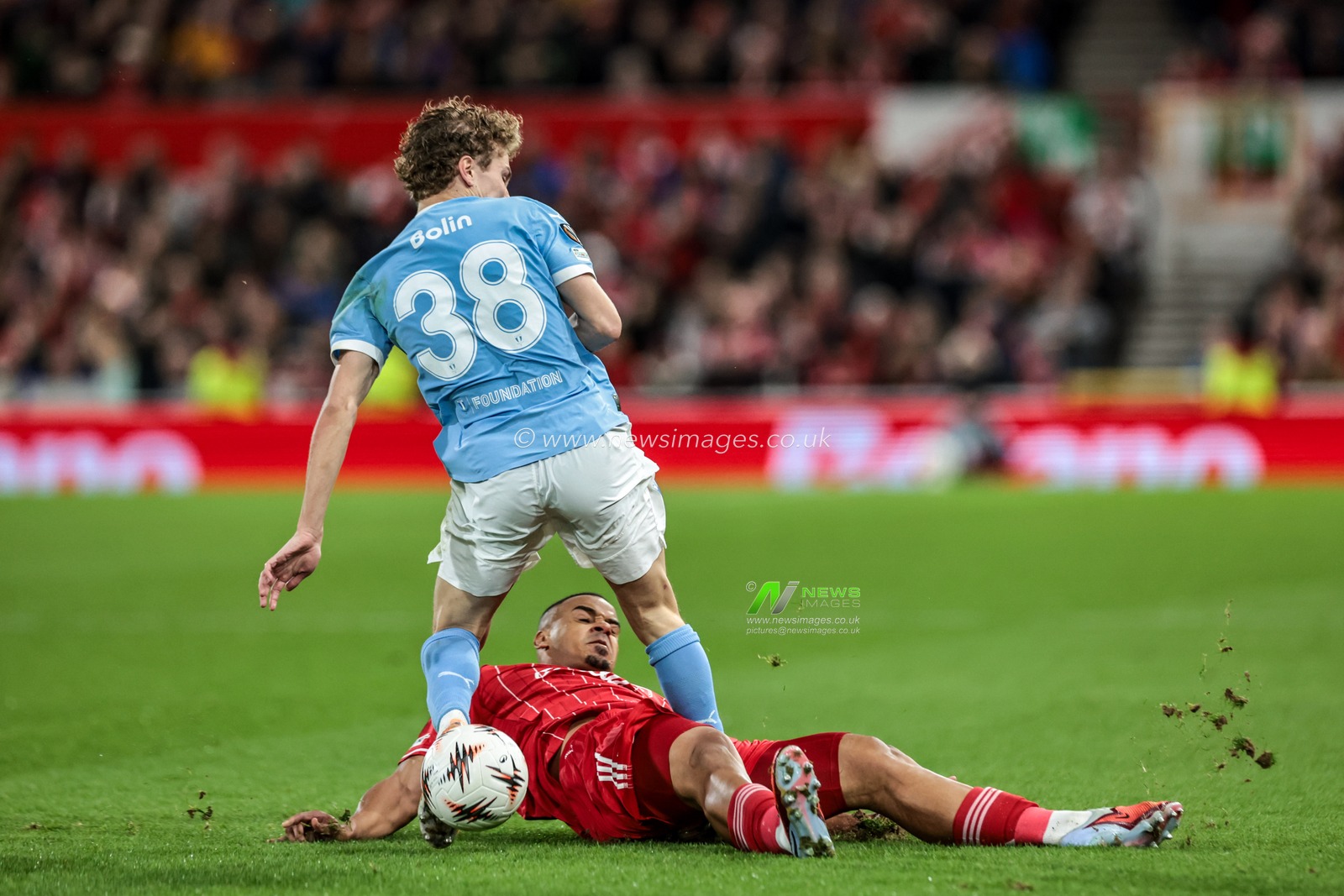 Hugo Bolin of Malmo FF is injured in a challenge with Murillo of Nottingham Forest during the UEFA Europa League Matchday 5 of 8 Nottingham Forest vs Malmo FF at City Ground, Nottingham, United Kingdom, 27th November 2025

(Photo by Mark Cosgrove/News Images)

*** GER AUT SUI OUT ***