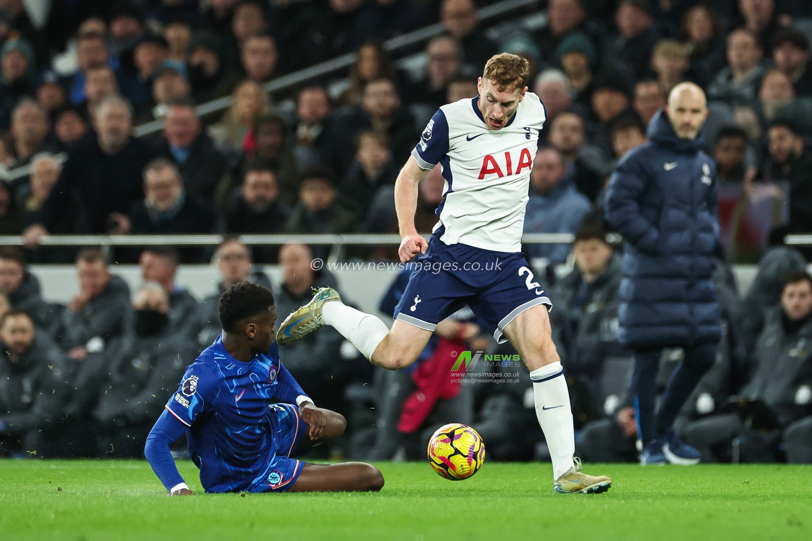 Dejan Kulusevski of Tottenham Hotspur is tackled by BenoÃ®t Badiashile of Chelsea during the Premier League match Tottenham Hotspur vs Chelsea at Tottenham Hotspur Stadium, London, United Kingdom, 8th December 2024

(Photo by Mark Cosgrove/News Images)