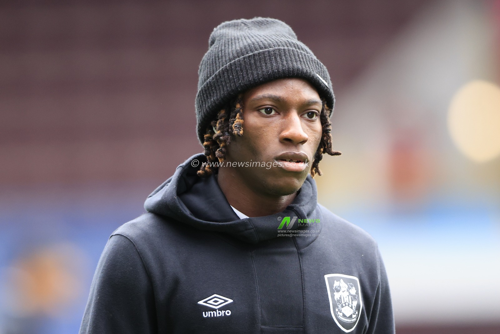 Joseph Hungbo #16 of Huddersfield Town during the pitch inspection ahead of the Sky Bet Championship match Burnley vs Huddersfield Town at Turf Moor, Burnley, United Kingdom, 25th February 2023

(Photo by Conor Molloy/News Images)