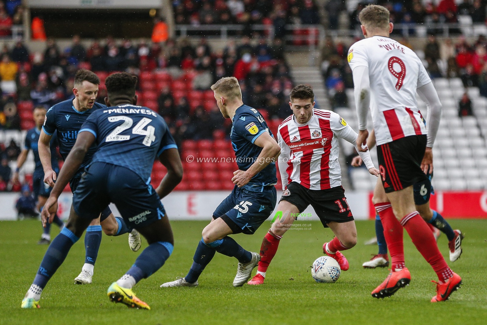 22nd February 2020, Stadium Of Light, Sunderland, England; Sky Bet League 1, Sunderland v Bristol Rovers : Lynden Gooch (11) of Sunderland takes on Cian Harries (25) of Bristol Rovers