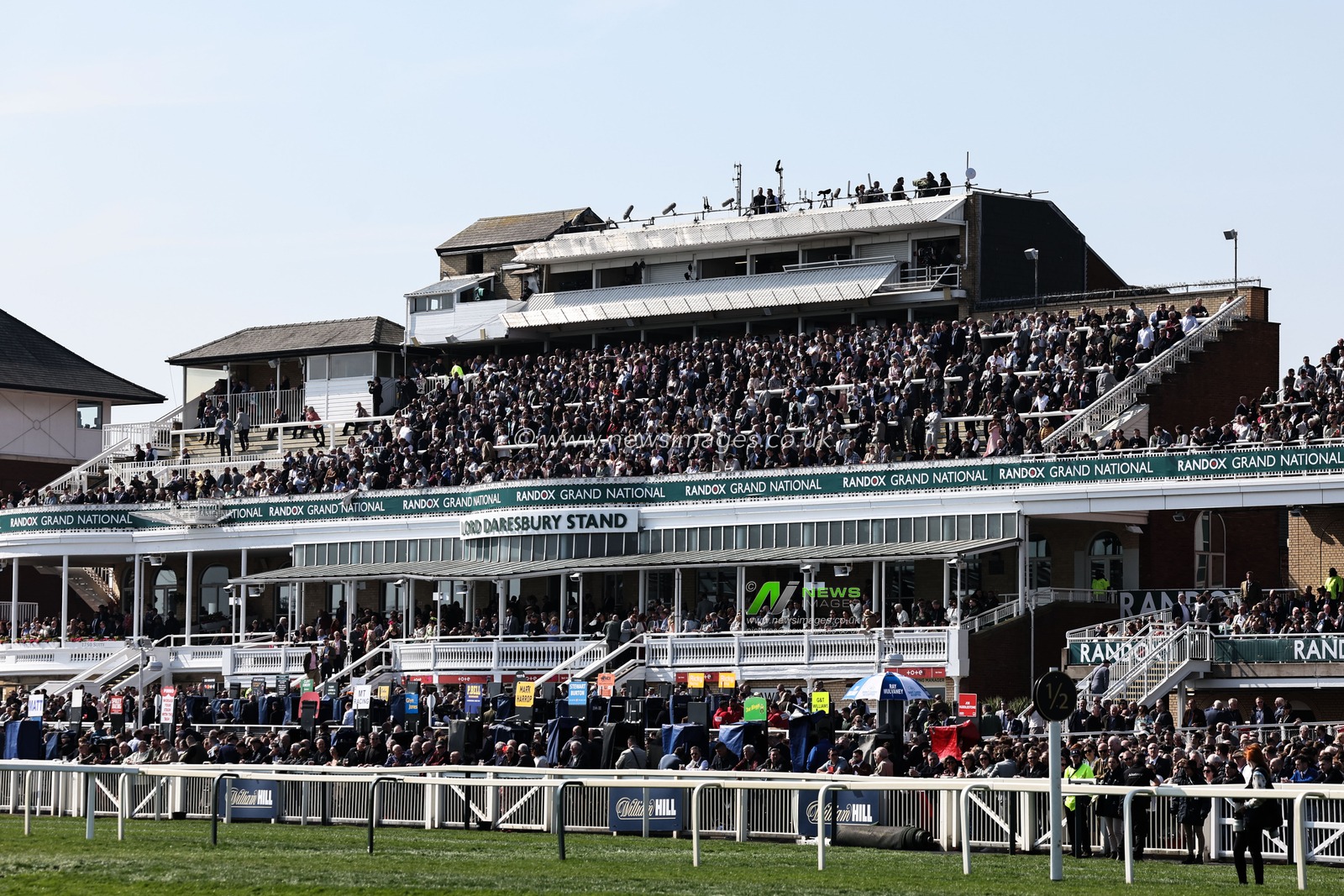 Racegoers fill the stand for the first race during the Randox Grand National 2025 Day 1 Opening Day at Aintree Racecourse, Liverpool, United Kingdom, 3rd April 2025

(Photo by Mark Cosgrove/News Images)