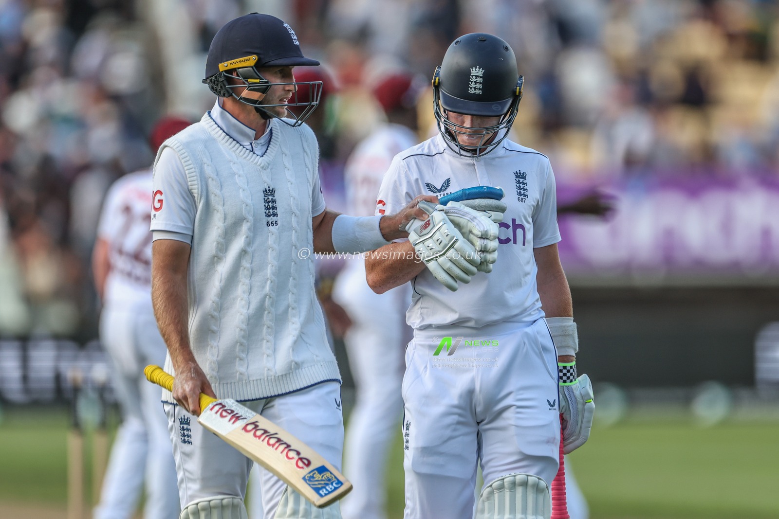 Joe Root of England bumps fists with Ollie Pope of England as they leave the field of play after the end of day one not out during the 3rd Rothesay Test Match Day One match England vs West Indies at Edgbaston, Birmingham, United Kingdom, 26th July 2024

(Photo by Mark Cosgrove/News Images)