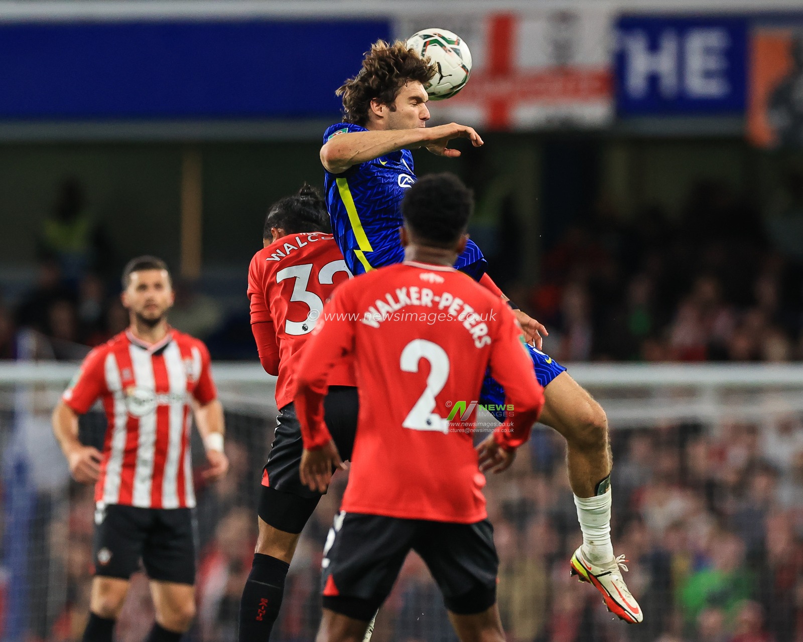 Marcos Alonso #3 of Chelsea wins the header