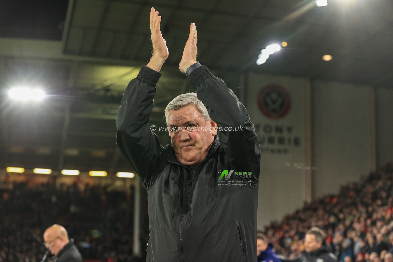 Steve Bruce manager of West Bromwich Albion applauds the traveling fans