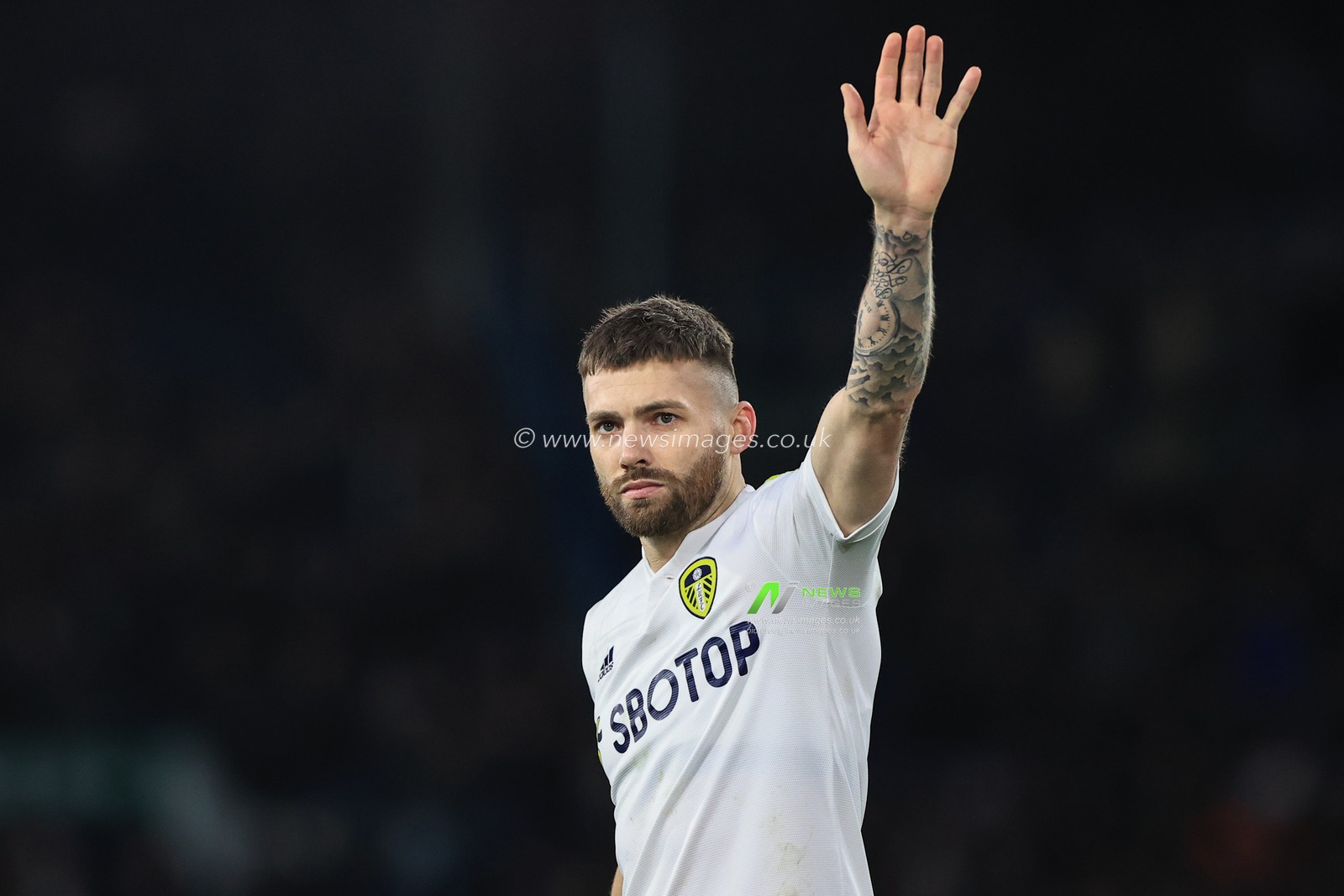 Stuart Dallas #15 of Leeds United applauds the fans as Leeds come back to draw 2-2
