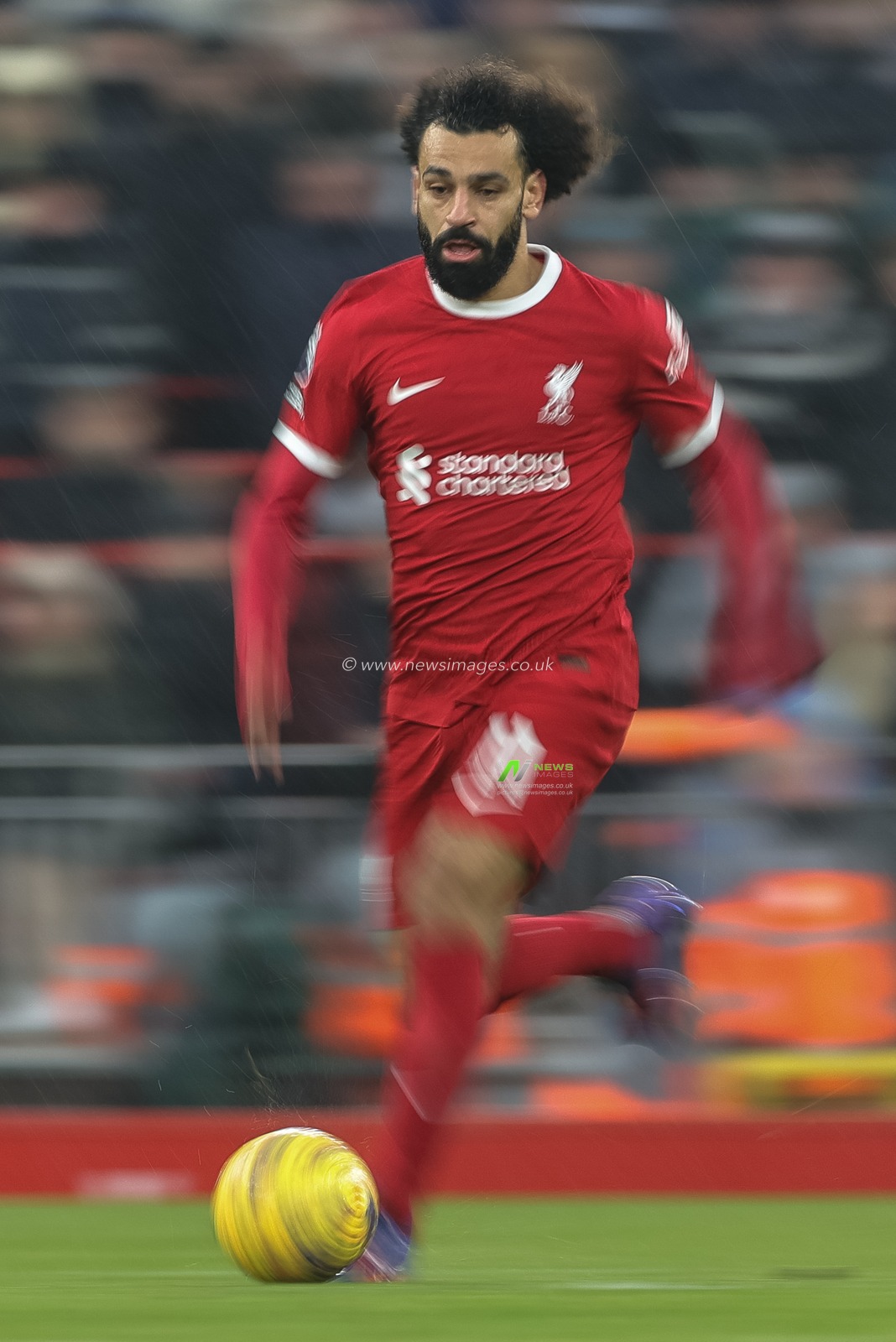Mohamed Salah #11 of Liverpool breaks with the ball during the Premier League match Liverpool vs Fulham at Anfield, Liverpool, United Kingdom, 3rd December 2023

(Photo by Mark Cosgrove/News Images)