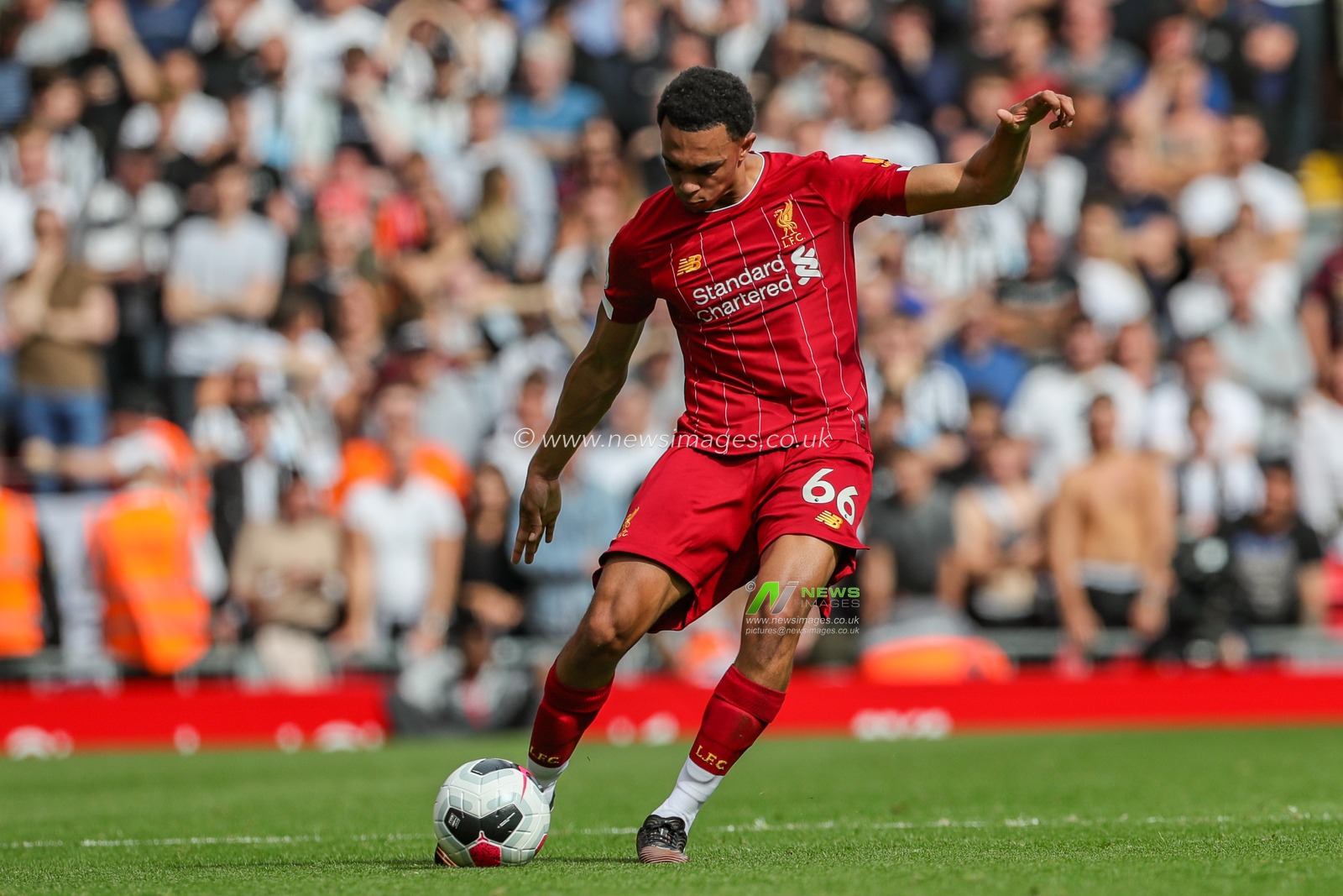 14th September 2019 , Anfield, Liverpool, England; Premier League Football, Liverpool vs Newcastle United ; Trent Alexander-Arnold (66) of Liverpool  crosses the ball 


Credit: Mark Cosgrove/News Images 


Premier League/EFL Football images are subject to DataCo Licence