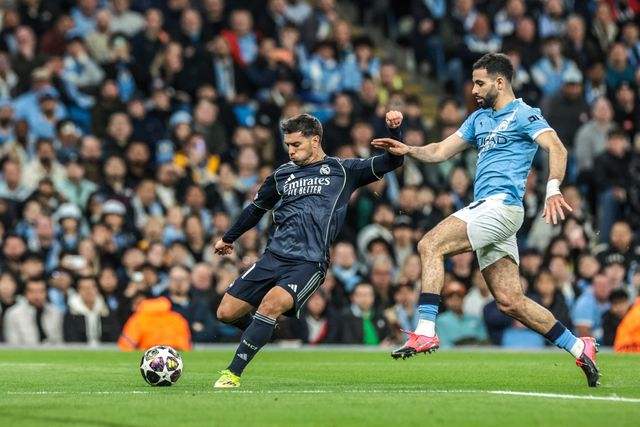 Brahim Diaz of Real Madrid shoots on goal under pressure from Rayan Ait-Nouri of Manchester City during the UEFA Champions League last 16 second leg match Manchester City vs Real Madrid at The City of Manchester Stadium, Manchester, United Kingdom on 17 March 2026

(Photo by Mark Cosgrove/News Images)