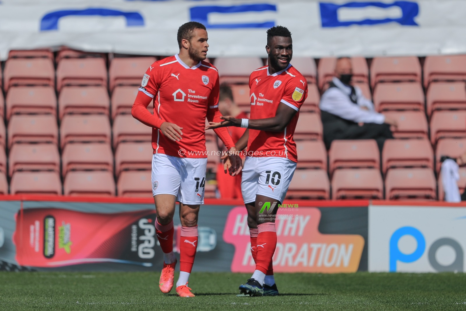 Carlton Morris #14 of Barnsley celebrates his goal to make it 1-0