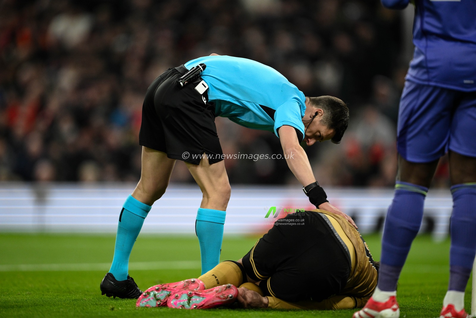Referee Benoit Bastien checks on Mikel Oyarzabal of Real Sociedad during the UEFA Europa League Last 16 match Manchester United vs Real Sociedad at Old Trafford, Manchester, United Kingdom, 13th March 2025

(Photo by Craig Thomas/News Images)