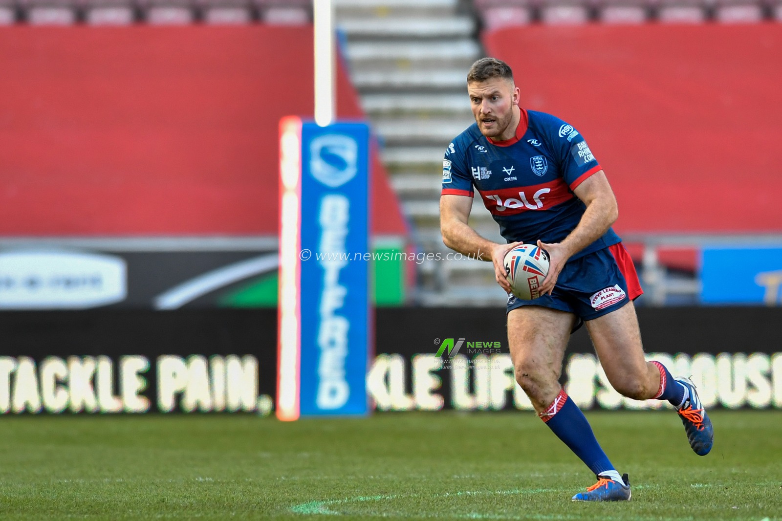 8th March 2020, DW Stadium, Wigan, England; Betfred Super League, Wigan Warriors v Hull KR : Will Maher (26) of Hull KR runs forward with the ball
