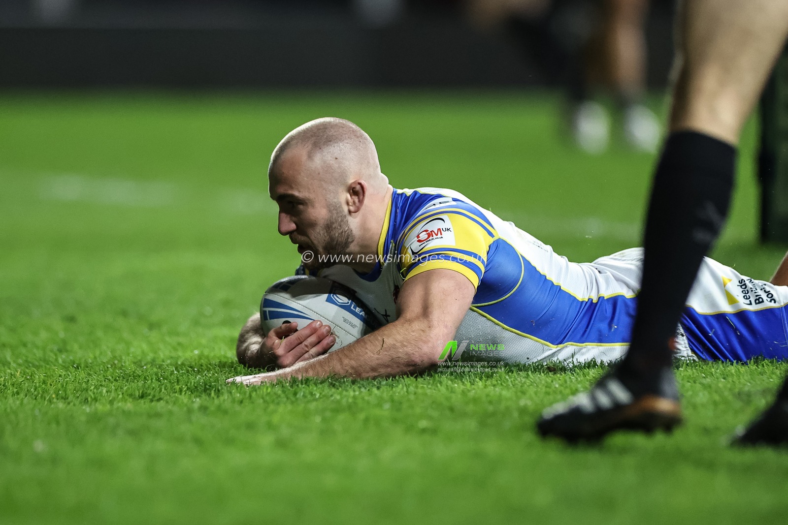 Jarrod Oâ€™Connor of Leeds Rhinos goes over for a try to make it 22-12 during the Betfred Super League Round 8 match Leeds Rhinos vs Huddersfield Giants at Headingley Stadium, Leeds, United Kingdom, 19th April 2024

(Photo by Mark Cosgrove/News Images)