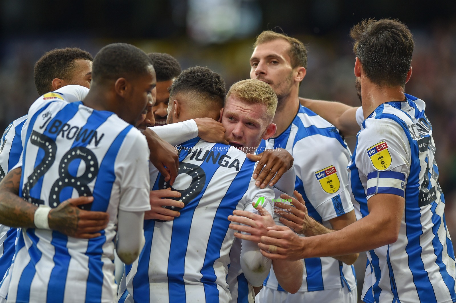 5th October 2019, John Smith's Stadium, Huddersfield, England; Sky Bet Championship, Huddersfield Town v Hull City :Huddersfield Town players celebrate Elias Kachunga (9) of Huddersfield Town goal to make it 3-0.
Credit: Dean Williams/News Images