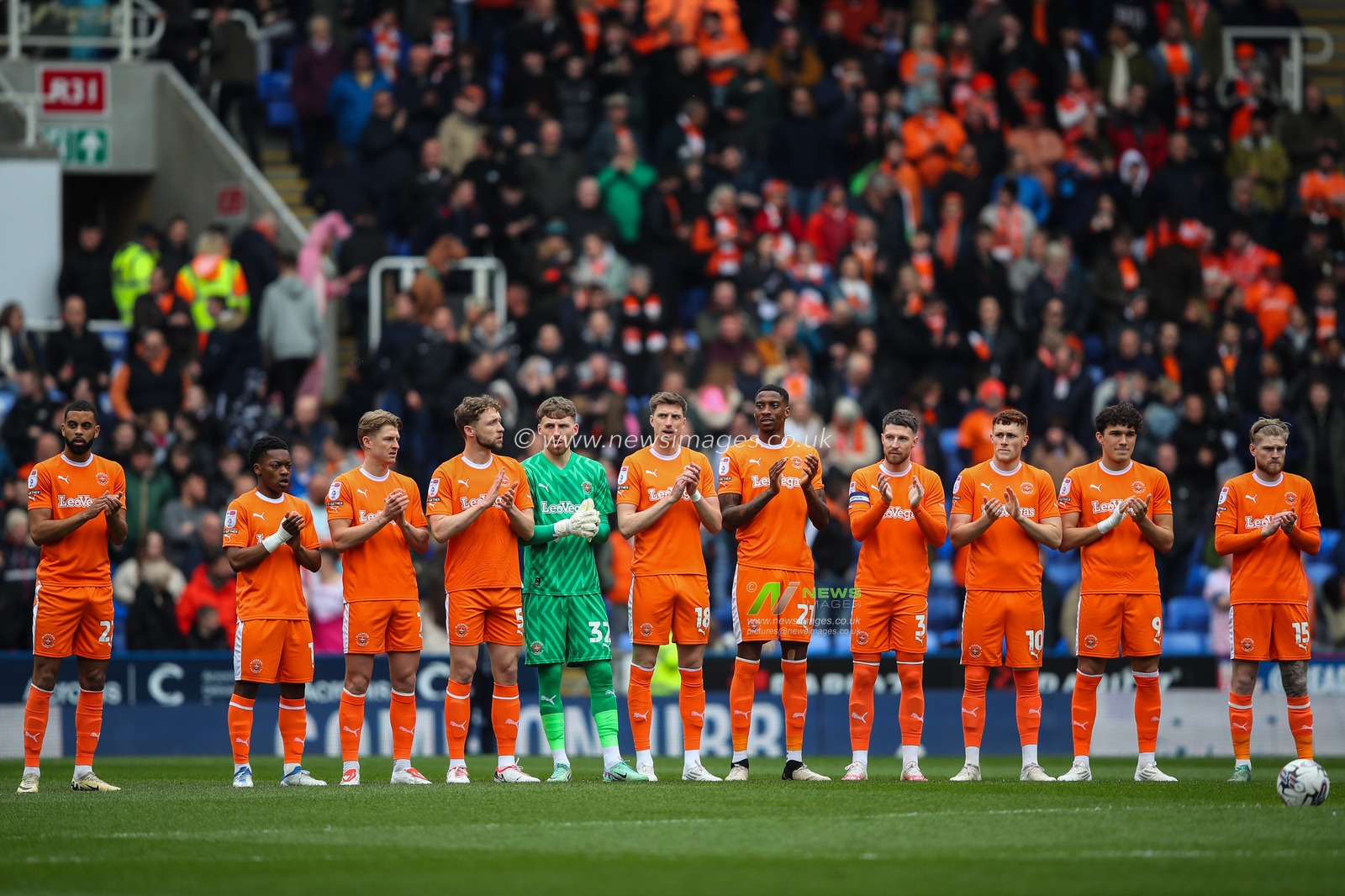 Blackpool players hold a minutes applause during the Sky Bet League 1 match Reading vs Blackpool at Select Car Leasing Stadium, Reading, United Kingdom, 27th April 2024

(Photo by Gareth Evans/News Images)