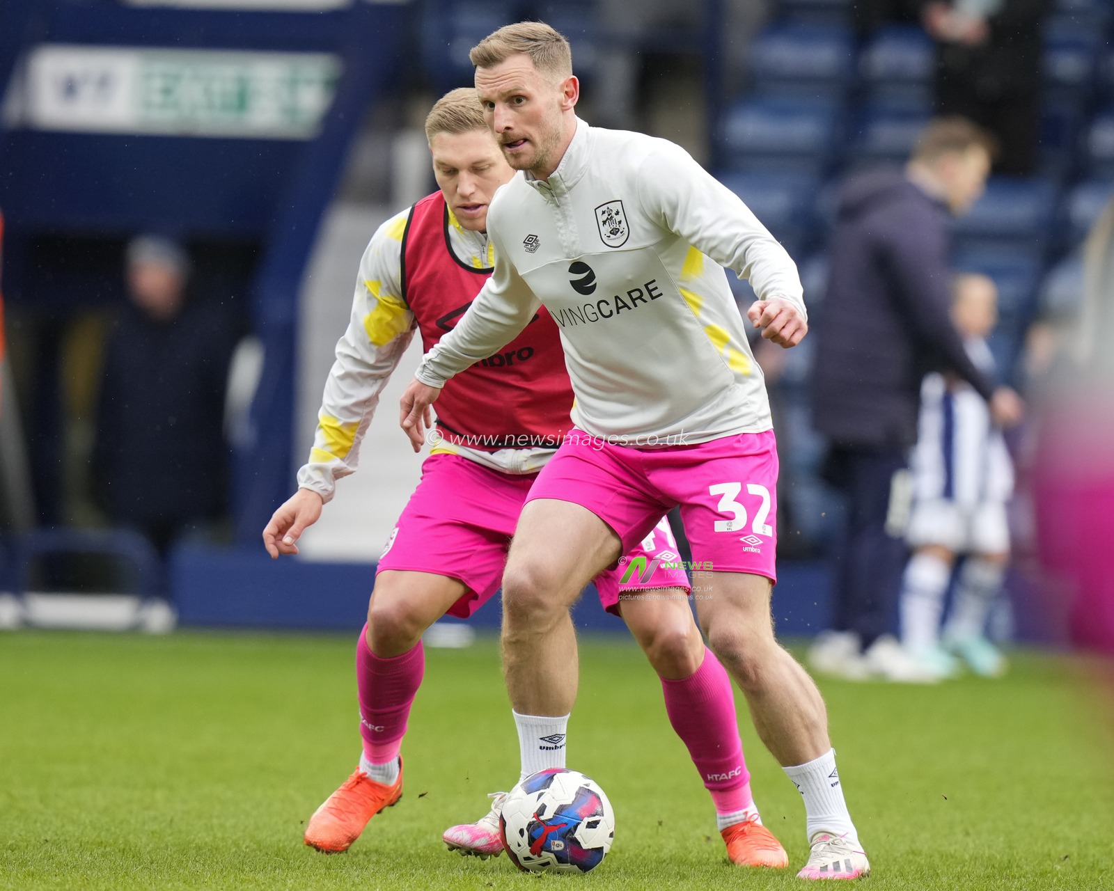 Tom Lees #32 of Huddersfield Town warms up before the Sky Bet Championship match West Bromwich Albion vs Huddersfield Town at The Hawthorns, West Bromwich, United Kingdom, 11th March 2023

(Photo by Steve Flynn/News Images)