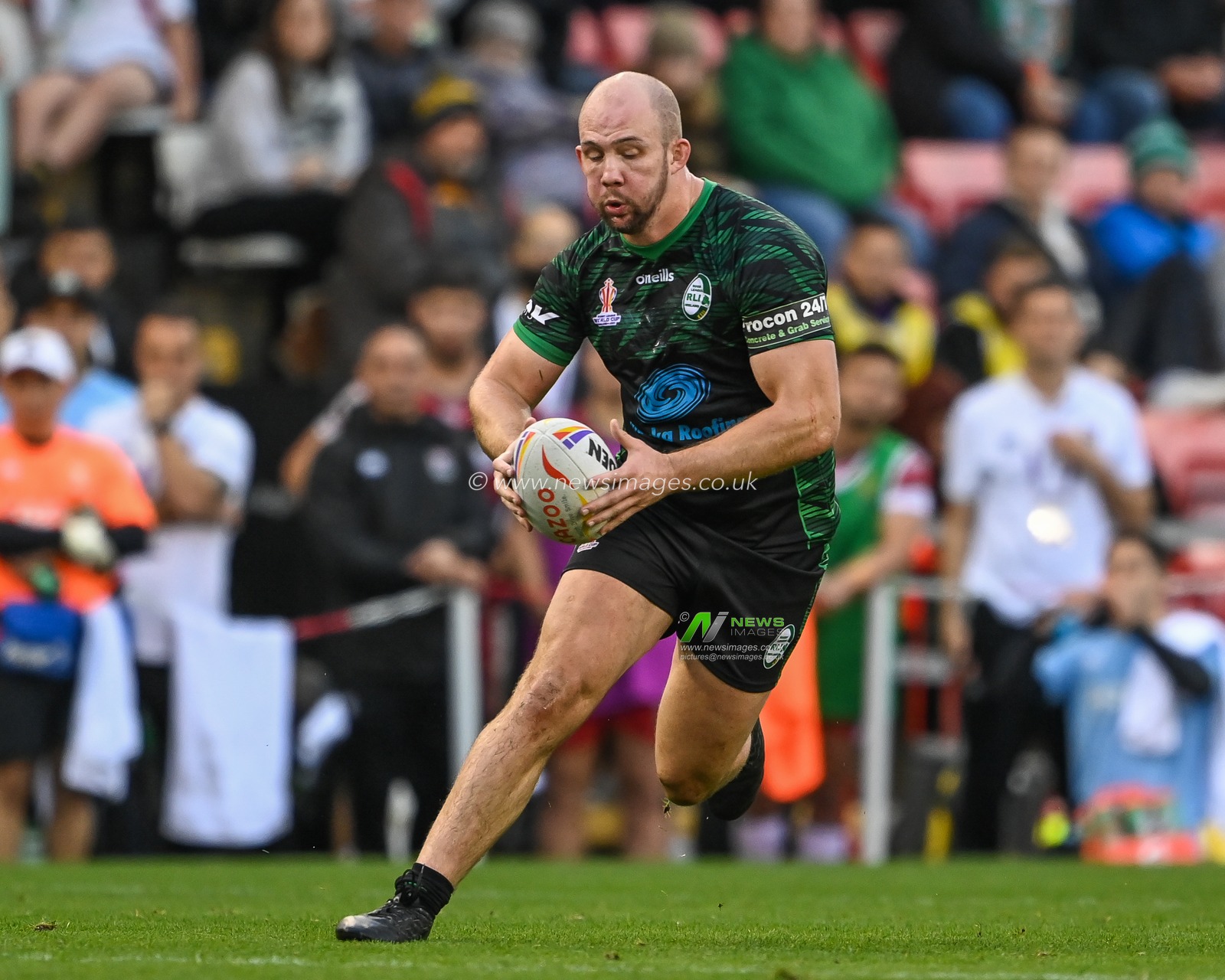 George King of Ireland makes a break during the Rugby League World Cup 2021 match Ireland vs Lebanon at Leigh Sports Village, Leigh, United Kingdom, 23rd October 2022

(Photo by Craig Thomas/News Images)