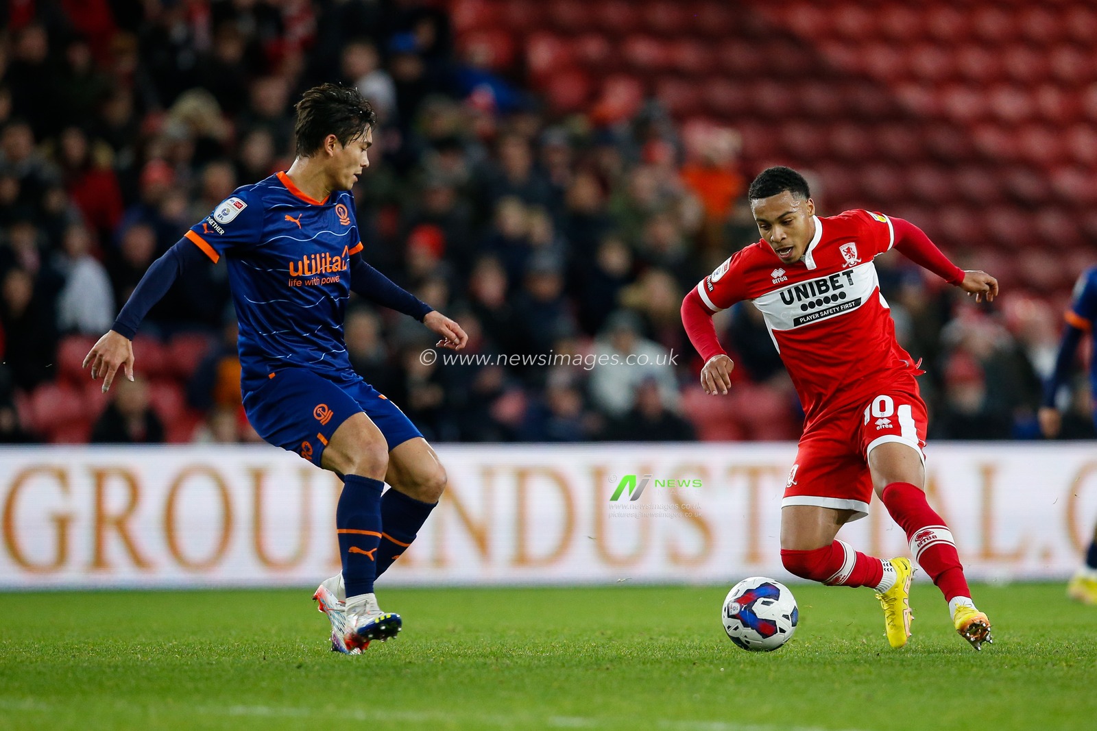 Kenny Dougall #12 of Blackpool and Cameron Archer #10 of Middlesbrough during the Sky Bet Championship match Middlesbrough vs Blackpool at Riverside Stadium, Middlesbrough, United Kingdom, 4th February 2023

(Photo by Ben Early/News Images)